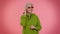 Portrait of seductive senior elderly old granny gray-haired woman wearing sunglasses, charming smile
