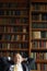 Portrait of senior businessman sitting in library