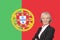 Portrait of senior businesswoman with pride over Portuguese flag