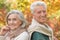 Portrait of a senior couple in autumnal park