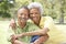 Portrait Of Senior Couple In Park