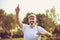 Portrait of senior golfer standing on court