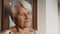 Portrait of senior gray haired woman looking in the distance
