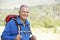 Portrait Of Senior Man On Hike