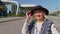 Portrait of senior pensioner tourist grandmother stay near airport hall waiting for plane, travel