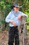 Portrait senior woman Australian sheep farmer in traditional Akubra.