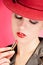 Portrait of sensuality stylish woman in red hat