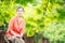 Portrait of serene mature woman in garden