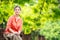 Portrait of serene mature woman in garden