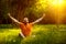 Portrait of serene meditating man with beard in a summer park