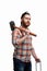 Portrait of serious bearded man in cap and checked shirt, holds hammer and chain on white background