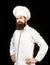 Portrait of a serious chef cook. Bearded chef, cooks or baker. Bearded male chefs isolated on black. Cook hat. Confident