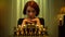 Portrait of serious focused redhead woman looking at chess board putting chin on hands looking at camera. Front view