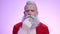 Portrait serious kind smiling modern Santa Claus, happy thinking face expression
