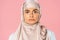 Portrait of serious muslim girl in hijab