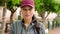 Portrait of a serious sports coach or athlete face outside in a park. Closeup headshot of an active african woman with