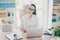 Portrait of serious young brunette businesswoman realtor in form