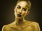 Portrait of sexual beautiful girl with luxury gold makeup