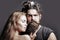 Portrait of sexy couple embracing. Bearded handsome man and female slim flexible body of young pretty sexy woman or girl