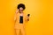 Portrait of shocked afro american girl use smartphone read news on social network account get notification about dislike