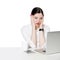 Portrait of shocked attractive brunette businesswoman in white shirt sitting looking at laptop display, reading unbelievable news