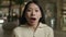 Portrait shocked confused frightened Asian woman japanese chinese korean girl astonish wonder amazed scared female with