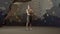 Portrait shot of strong male athlete standing in bouldering gym