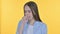 Portrait of Sick Casual Young Woman Coughing, Yellow Background