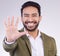 Portrait, smile and Asian man with stop, hand and communication against grey studio background. Face Japanese male or