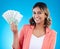 Portrait, smile and business woman with euros in studio isolated on a blue background. Financial winner, face and happy