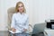 Portrait of smiled blonde nurse at work