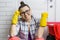 Portrait of smiling adult woman in glasses, rubber gloves doing house cleaning, female cleaning bathroom