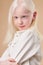 Portrait of smiling albino child 