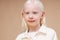 Portrait of smiling albino child isolated
