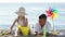 Portrait of smiling boy and girl on beach