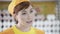 Portrait of smiling caucasian female staff saleswoman talking to buyer and standing in grocery section of supermarket