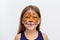 Portrait smiling child with tiger face painting