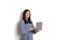 Portrait, smiling confident pretty woman long sleeve dress, holding grey laptop device and typing while standing against solid whi