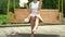 Portrait of a smiling excited girl holding cotton candy at amusement park