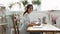 Portrait of smiling female decorator in headphones in office