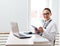 Portrait of a smiling female doctor at her workplace