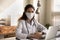 Portrait of smiling female doctor work in facemask