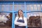 Portrait Of Smiling Female Small Business Owner Standing Outside Shop On Local High Street