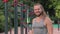 Portrait of a smiling fitness instructor with long light hair and beard