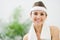 Portrait of smiling fitness woman with towel