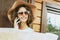 Portrait of smiling girl traveling with map and mobile