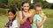 Portrait of smiling girls holding water gun