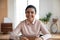 Portrait of smiling indian female speak on video call