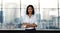 Portrait of a Smiling Mixed Races Business Woman, Crossed Arm and Look into the Camera