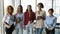 Portrait of smiling multiethnic female team in office